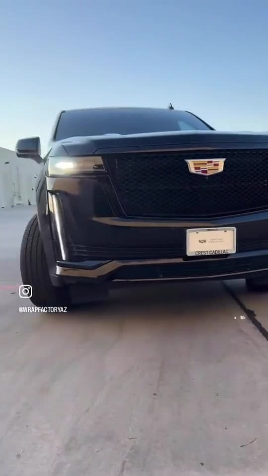 Black Cadillac presented after exterior finish work